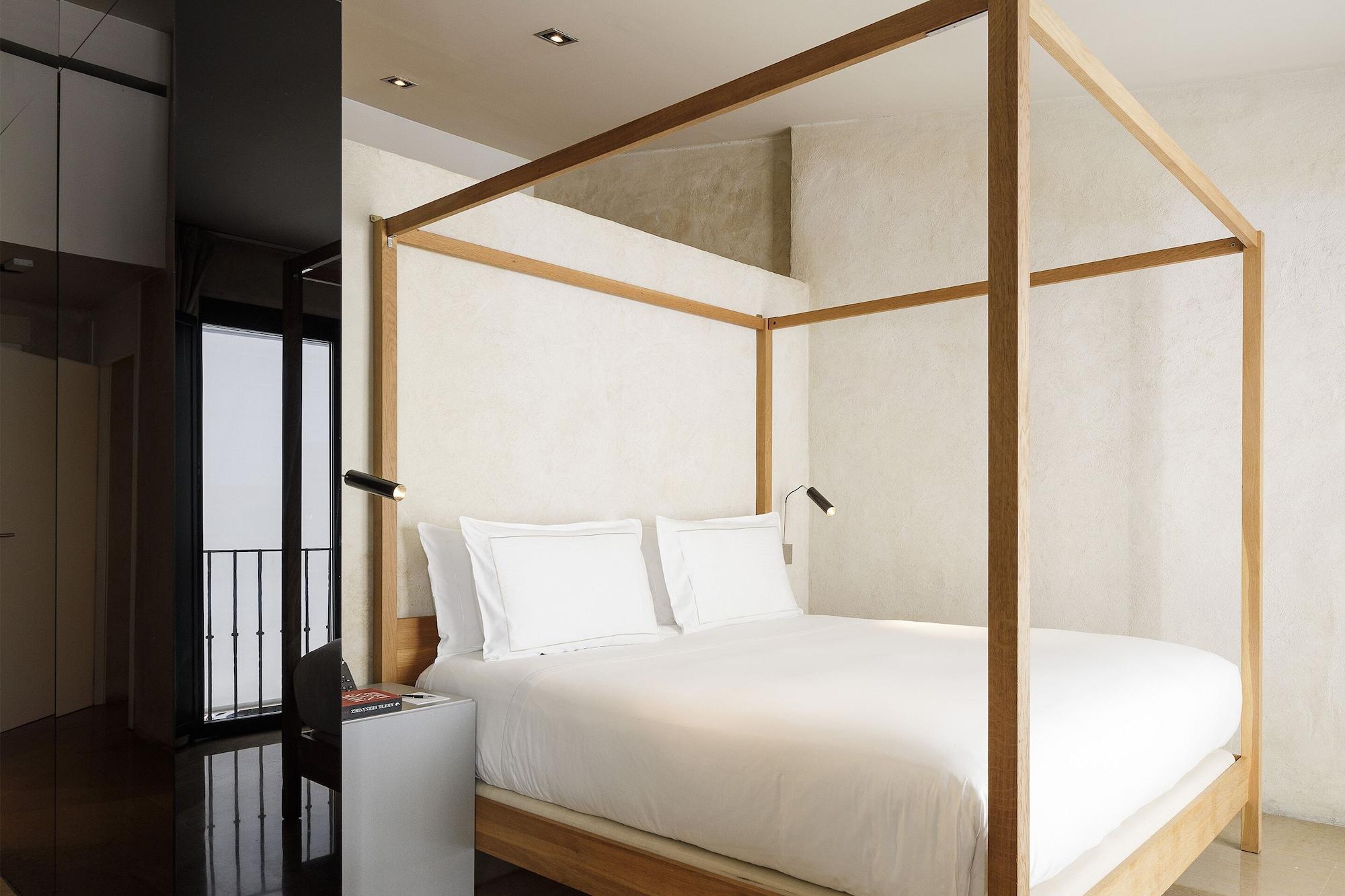 Eme Catedral Mercer Hotel Sevilha Exterior foto A bedroom at the hotel